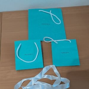 Tiffany & Co. Turquoise Bags with White Ribbons